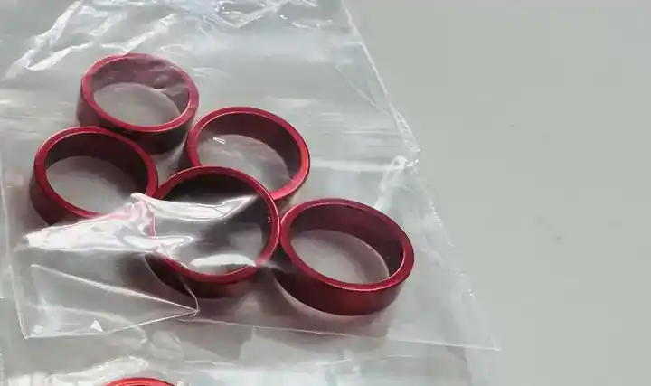 Red anodized aluminum identification ring samples